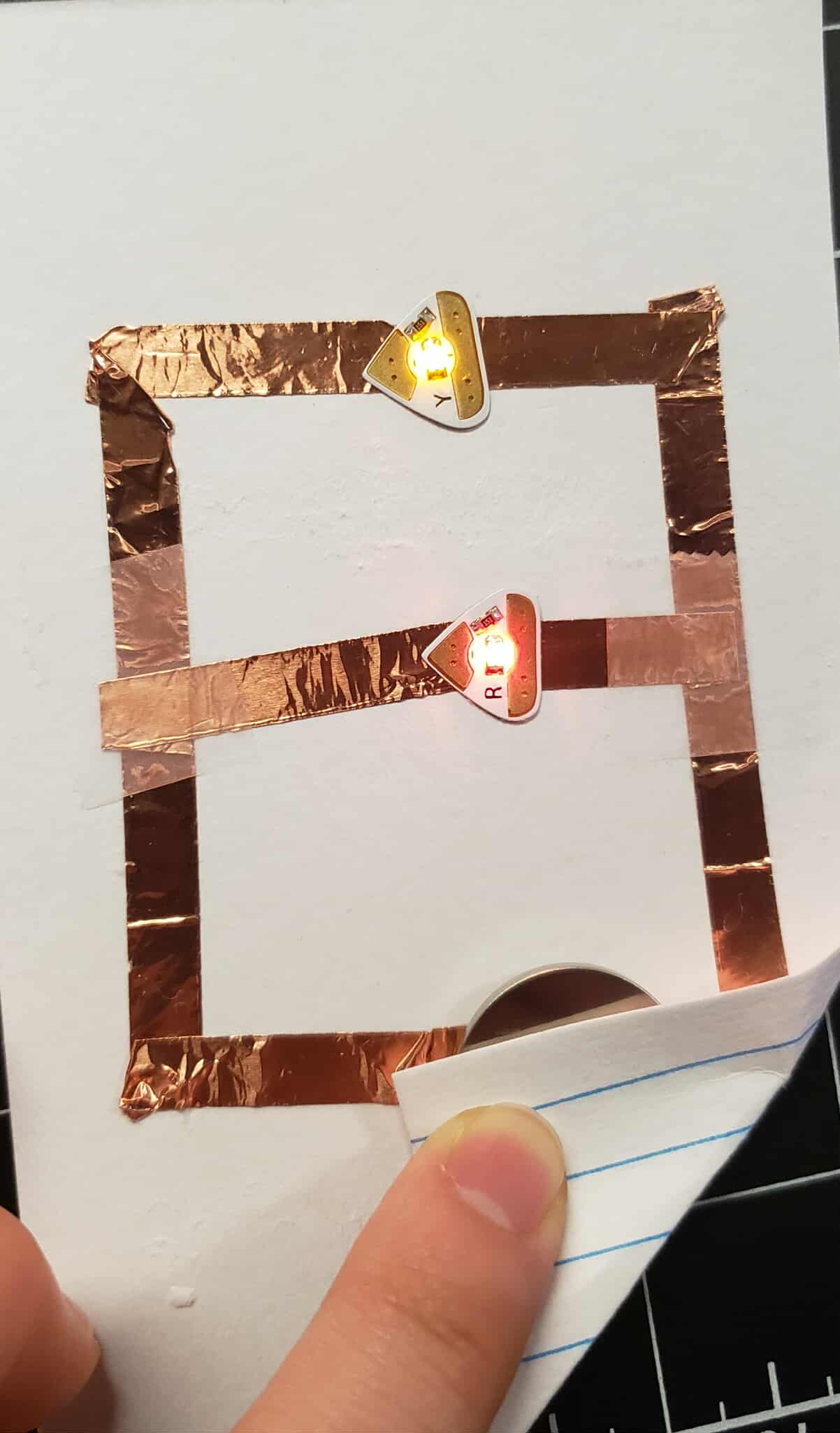 an activated parallel circuit with 2 sticker lights. Turns out the yellow light was not positioned closely enough.