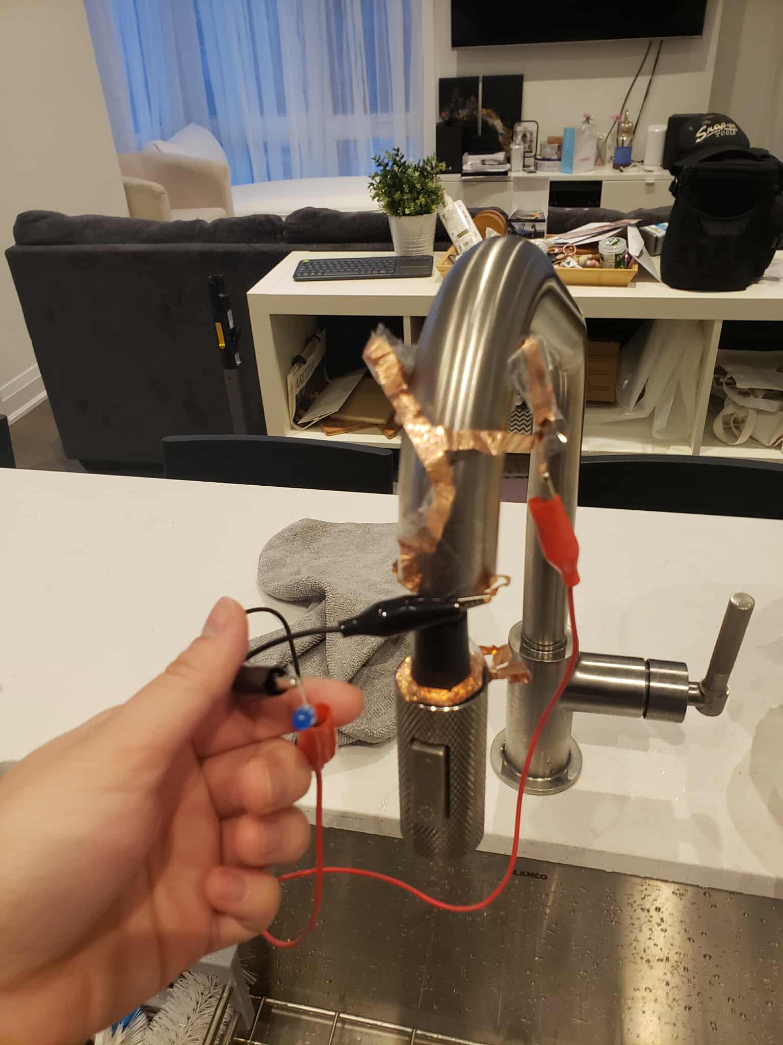 A turned off circuit using the faucet's ability to extend.